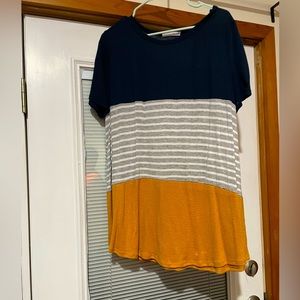This shirt sleeve top is butter soft and perfect for ETSU!